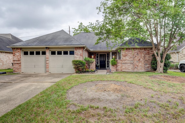 ranch-style house featuring roof with shingles, a front lawn, brick siding, a garage, and concrete driveway