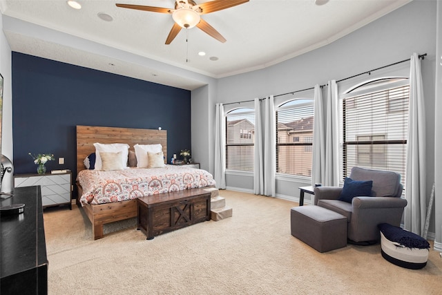 bedroom featuring baseboards, ornamental molding, carpet, and a ceiling fan