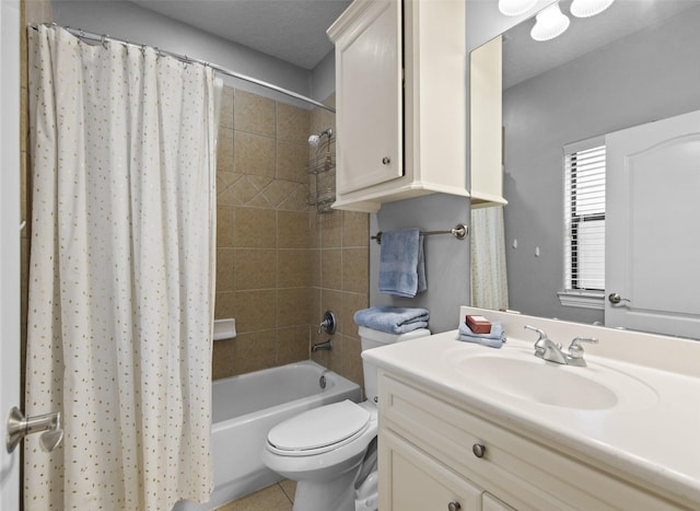 bathroom with vanity, toilet, and shower / tub combo