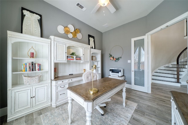 23935 Birchwood Lake Ln, Katy, TX 77493 - office space with visible vents, light wood-style floors, ceiling fan, and baseboards