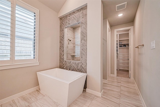2502 Forest Side Ct, Missouri City, TX 77459 - full bath featuring a soaking tub, plenty of natural light, visible vents, and a tile shower
