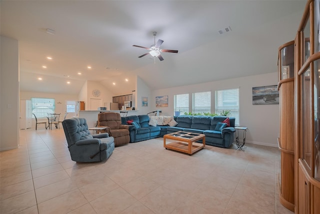 2903 Blue Mist Bnd, Brookshire, TX 77423 - living room with vaulted ceiling, ceiling fan, light tile patterned floors, recessed lighting, and baseboards
