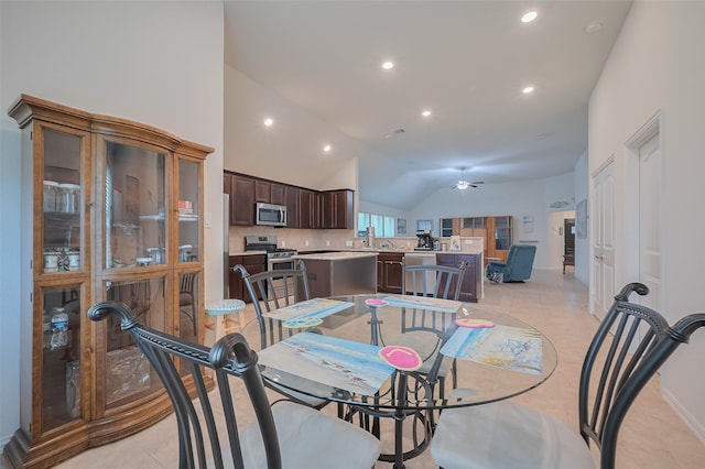 2903 Blue Mist Bnd, Brookshire, TX 77423 - dining area with a ceiling fan, recessed lighting, light tile patterned flooring, baseboards, and high vaulted ceiling