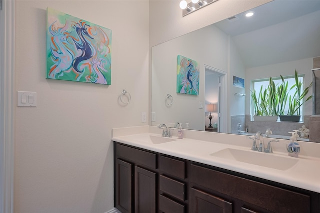 2903 Blue Mist Bnd, Brookshire, TX 77423 - bathroom with vaulted ceiling and double vanity