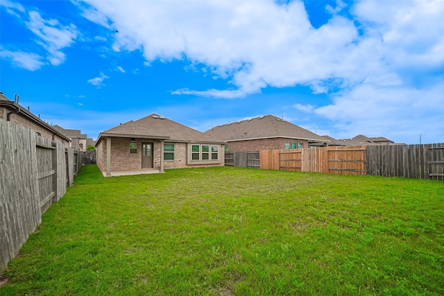 2903 Blue Mist Bnd, Brookshire, TX 77423 - back of property featuring a patio