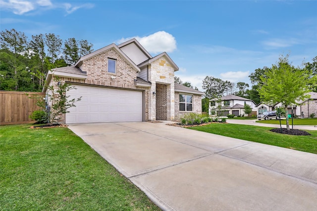 21623 Mount Frisell Ln, Porter, TX 77365 - view of front of property with fence, a front yard, stone siding, brick siding, and concrete driveway