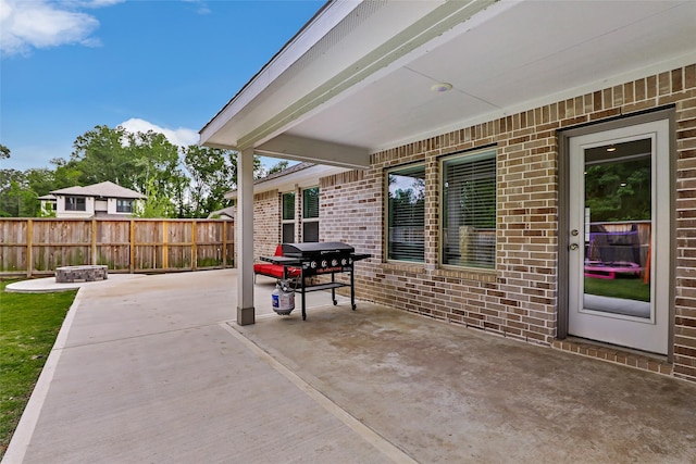 21623 Mount Frisell Ln, Porter, TX 77365 - view of patio / terrace with area for grilling and fence