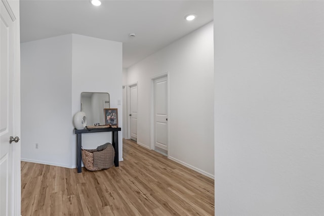 21623 Mount Frisell Ln, Porter, TX 77365 - hall with recessed lighting, baseboards, and light wood-type flooring