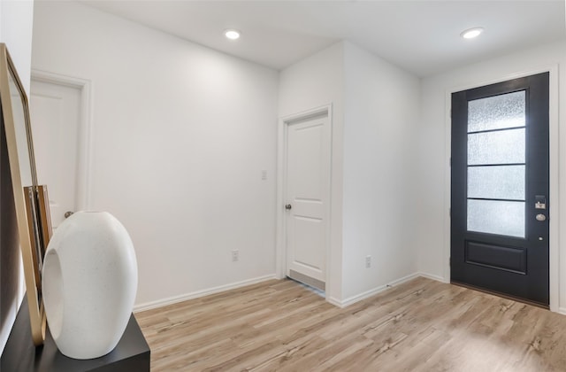 21623 Mount Frisell Ln, Porter, TX 77365 - entryway featuring baseboards, recessed lighting, and light wood-style flooring