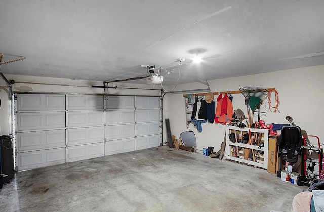 garage featuring a garage door opener