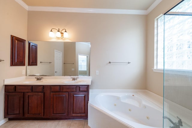 full bath featuring ornamental molding, a sink, and a jetted tub