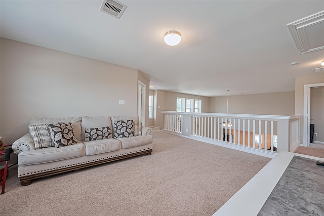 11351 Needlerock Ct, Humble, TX 77396 - living room with attic access, carpet floors, and baseboards
