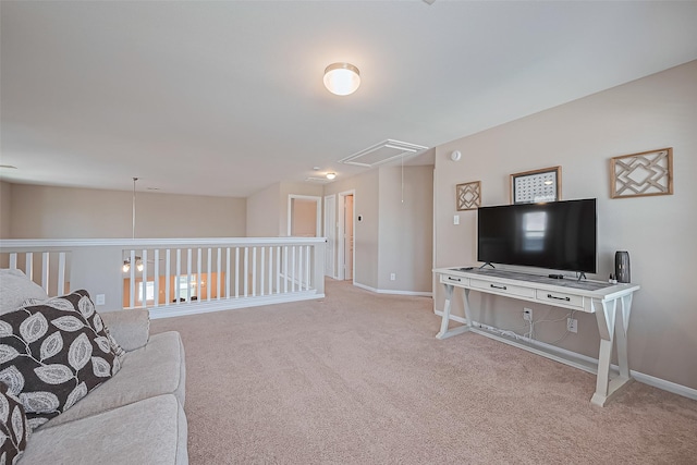 11351 Needlerock Ct, Humble, TX 77396 - carpeted living room with attic access and baseboards
