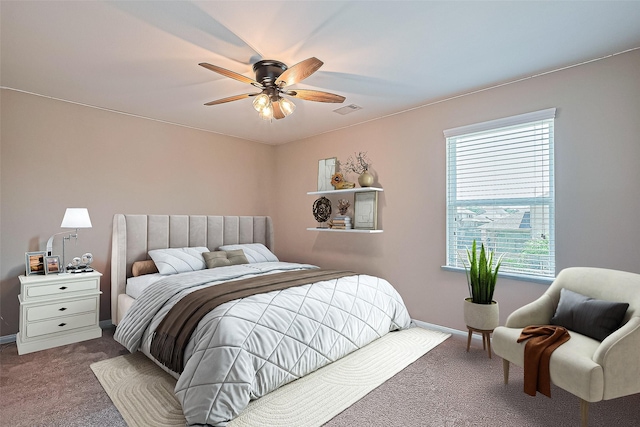 11351 Needlerock Ct, Humble, TX 77396 - bedroom featuring carpet floors, baseboards, and a ceiling fan