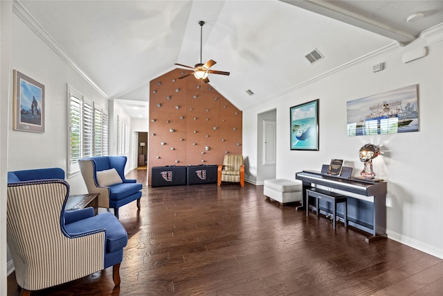 sitting room with ceiling fan, visible vents, baseboards, wood finished floors, and vaulted ceiling