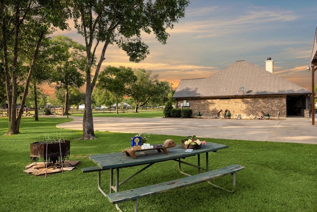 view of home's community featuring a yard