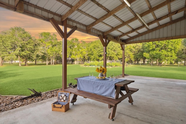 patio terrace at dusk with a lawn