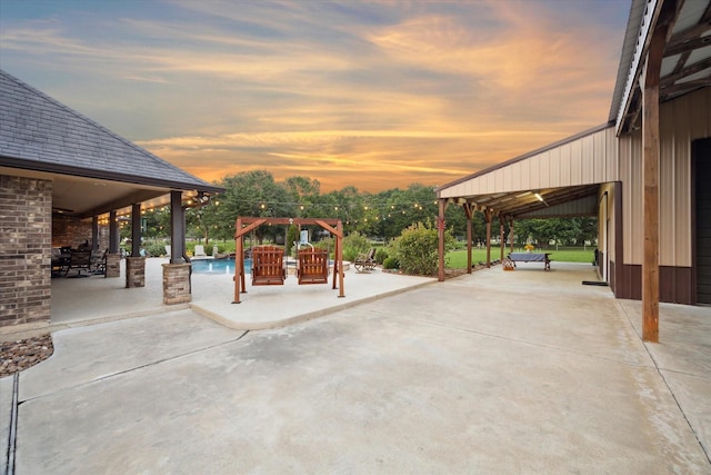 view of patio with a gazebo and an outdoor pool