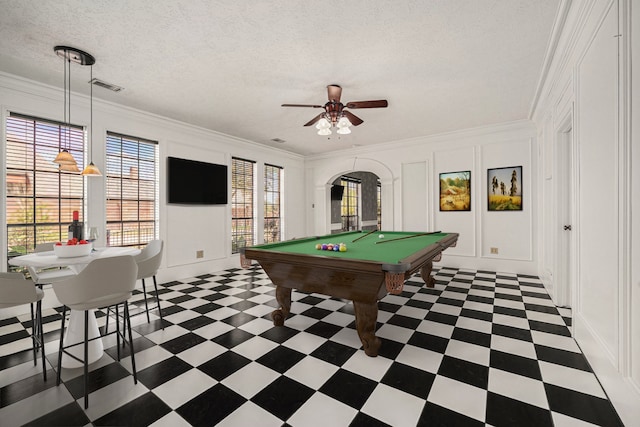 7415 Naremore Dr, Spring, TX 77379 - recreation room with tile patterned floors, visible vents, a decorative wall, and arched walkways