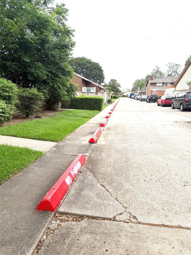 12606 Newbrook Dr, Houston, TX 77072 - view of road featuring sidewalks