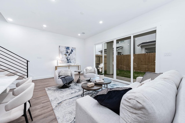 3515 Mcilhenny St, Houston, TX 77004 - living area with stairs, recessed lighting, baseboards, and wood finished floors