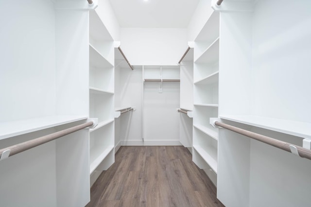 3515 Mcilhenny St, Houston, TX 77004 - spacious closet featuring dark wood-style flooring