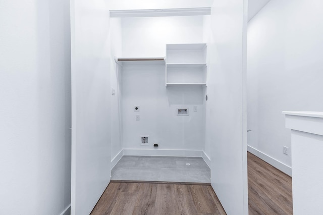 3515 Mcilhenny St, Houston, TX 77004 - laundry area featuring washer hookup, laundry area, electric dryer hookup, wood finished floors, and baseboards