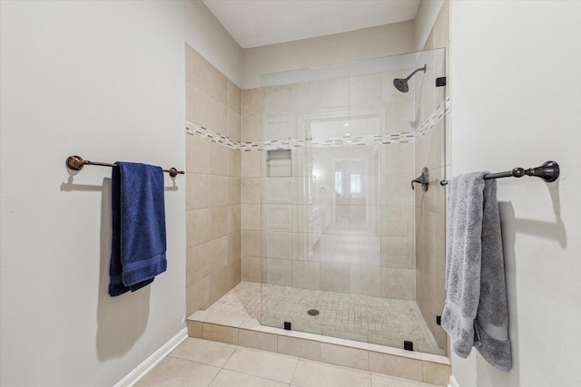 214 Sugarberry Cir, Houston, TX 77024 - full bath featuring baseboards, tile patterned floors, and tiled shower