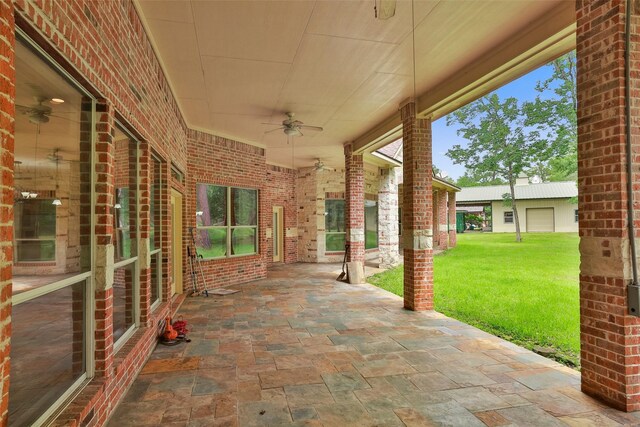 view of patio featuring ceiling fan