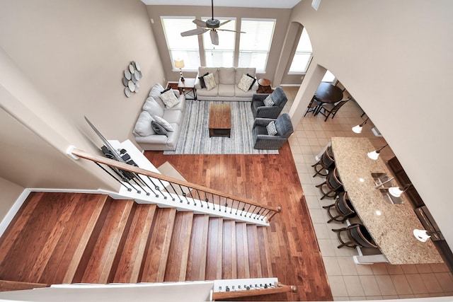 7603 Chimney Gap, Missouri City, TX 77459 - living room featuring a ceiling fan and arched walkways