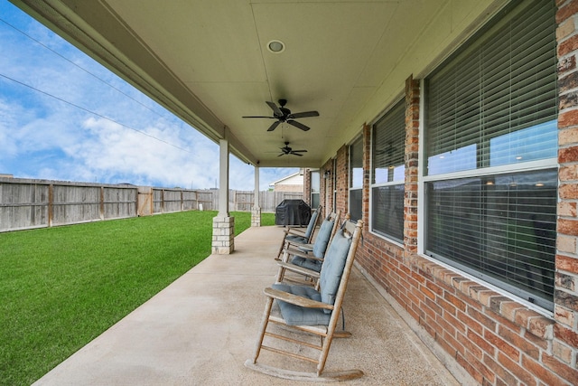 7603 Chimney Gap, Missouri City, TX 77459 - view of patio with a ceiling fan, a fenced backyard, and a grill