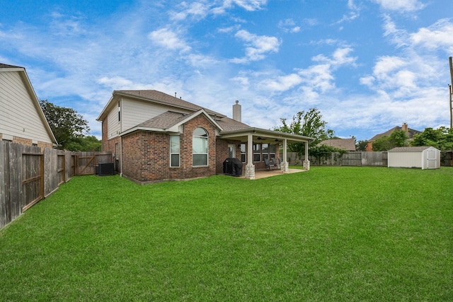 7603 Chimney Gap, Missouri City, TX 77459 - rear view of property featuring a fenced backyard, a patio, ceiling fan, and a shed