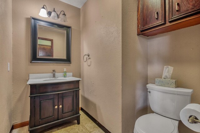 7739 County Road 684, Sweeny, TX 77480 - half bath with toilet, baseboards, and vanity