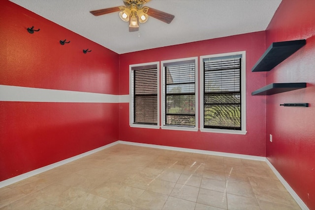 7739 County Road 684, Sweeny, TX 77480 - unfurnished room with ceiling fan and tile patterned floors