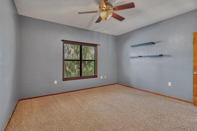 7739 County Road 684, Sweeny, TX 77480 - unfurnished room with carpet floors, baseboards, a ceiling fan, and a textured ceiling