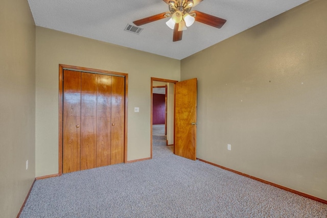 7739 County Road 684, Sweeny, TX 77480 - unfurnished bedroom with carpet, a closet, and ceiling fan