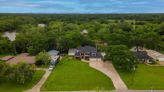 7739 County Road 684, Sweeny, TX 77480 - bird's eye view of a heavily wooded area and a nearby body of water