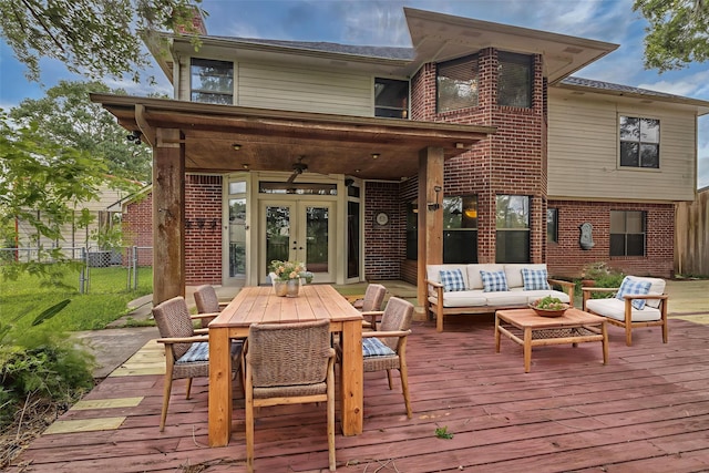 7739 County Road 684, Sweeny, TX 77480 - wooden deck with french doors, an outdoor hangout area, and ceiling fan