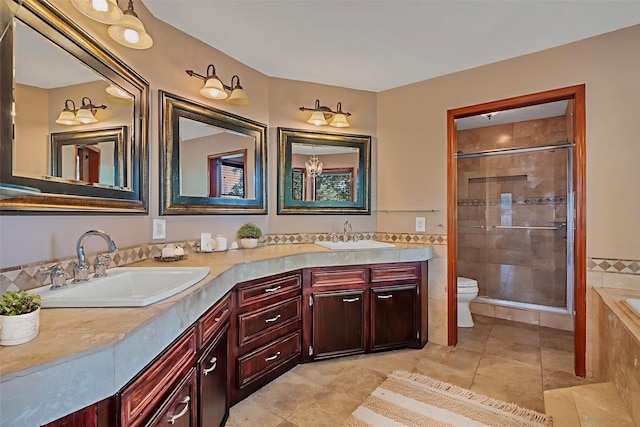 7739 County Road 684, Sweeny, TX 77480 - full bath featuring a shower stall, double vanity, a garden tub, and tile patterned floors