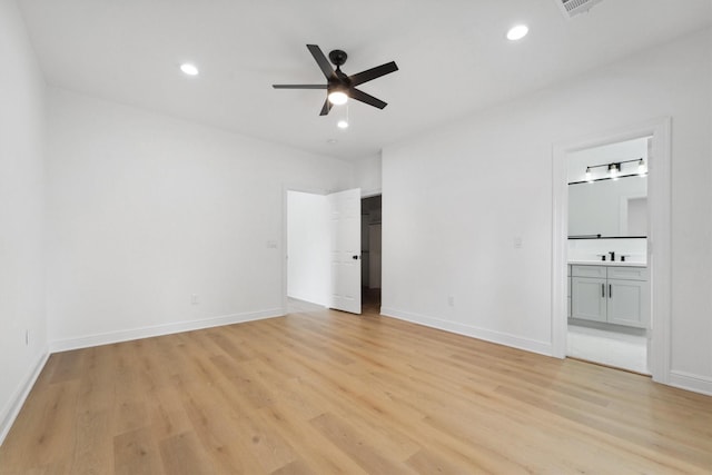 5013 Golden Forest Dr, Houston, TX 77091 - unfurnished bedroom featuring light wood-type flooring, baseboards, connected bathroom, recessed lighting, and a ceiling fan