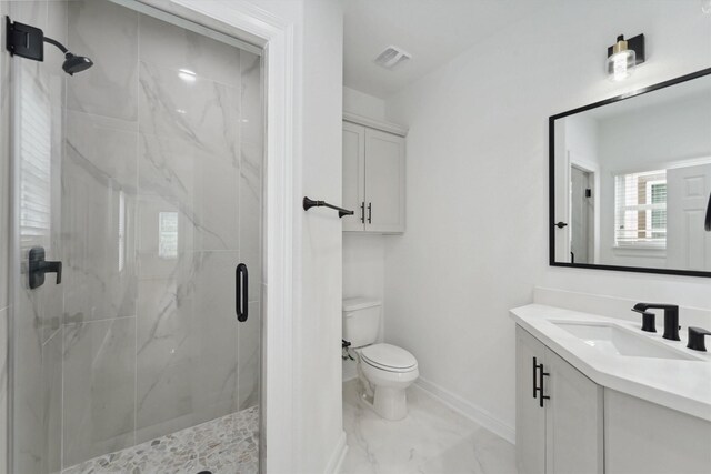 5013 Golden Forest Dr, Houston, TX 77091 - full bathroom featuring a marble finish shower, marble finish flooring, toilet, vanity, and baseboards