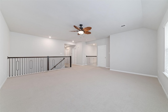 carpeted spare room with recessed lighting, ceiling fan, visible vents, and baseboards