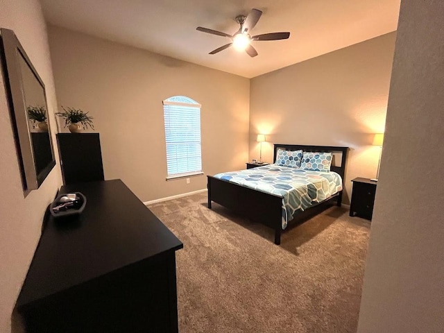bedroom with baseboards, carpet, and ceiling fan