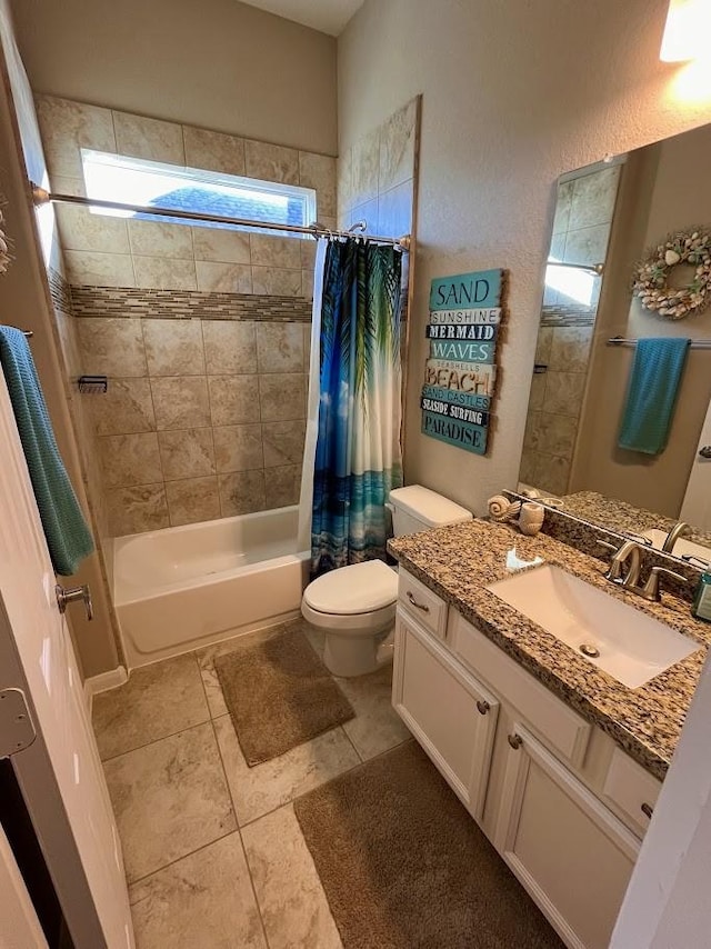 full bath featuring vanity, tile patterned flooring, toilet, and shower / bathtub combination with curtain