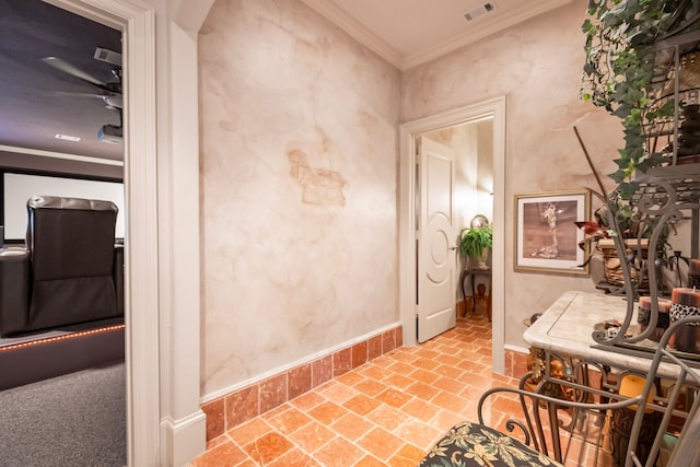 392 Green Cove Dr, Montgomery, TX 77356 - interior space featuring baseboards, ornamental molding, visible vents, and brick floor