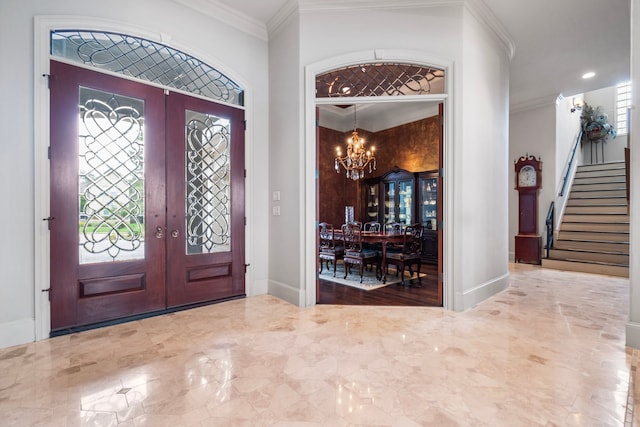 392 Green Cove Dr, Montgomery, TX 77356 - entrance foyer with stairs, crown molding, a chandelier, and french doors