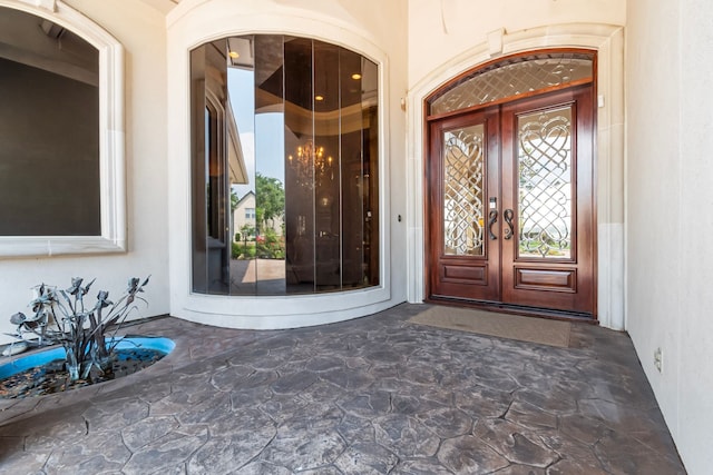 392 Green Cove Dr, Montgomery, TX 77356 - doorway to property with french doors and stucco siding