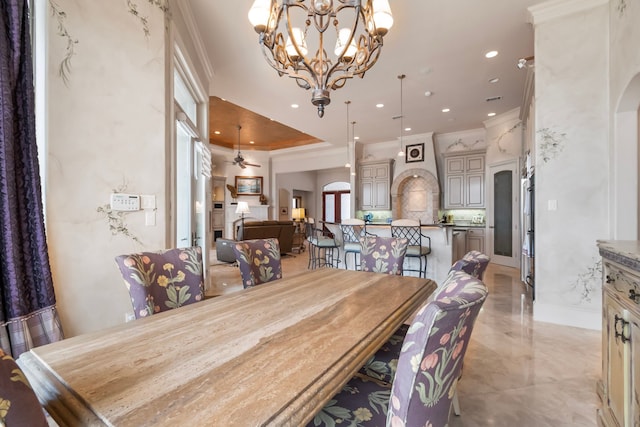392 Green Cove Dr, Montgomery, TX 77356 - dining space featuring crown molding, arched walkways, recessed lighting, and marble finish floor