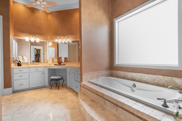 392 Green Cove Dr, Montgomery, TX 77356 - bathroom with vanity, a ceiling fan, a garden tub, and a towering ceiling