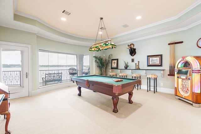 392 Green Cove Dr, Montgomery, TX 77356 - game room featuring carpet floors, ornamental molding, a tray ceiling, and visible vents